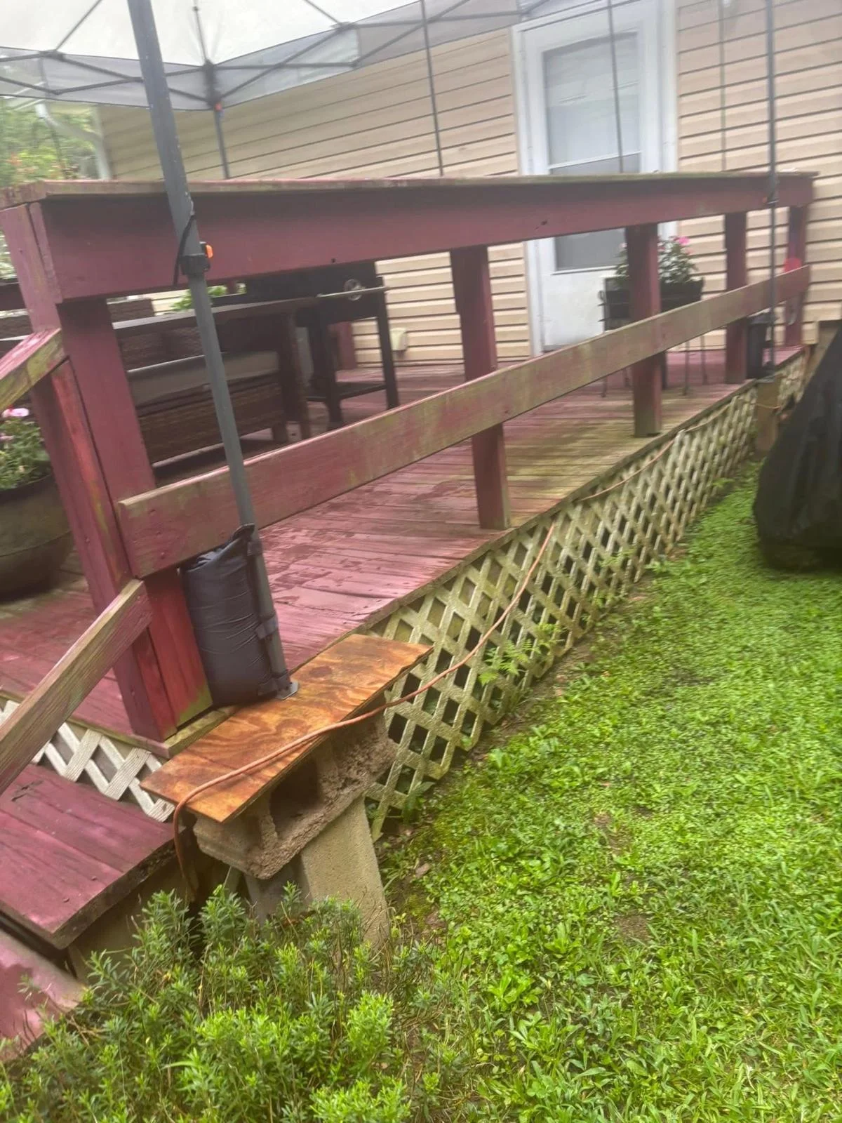 Wooden deck before pressure washing